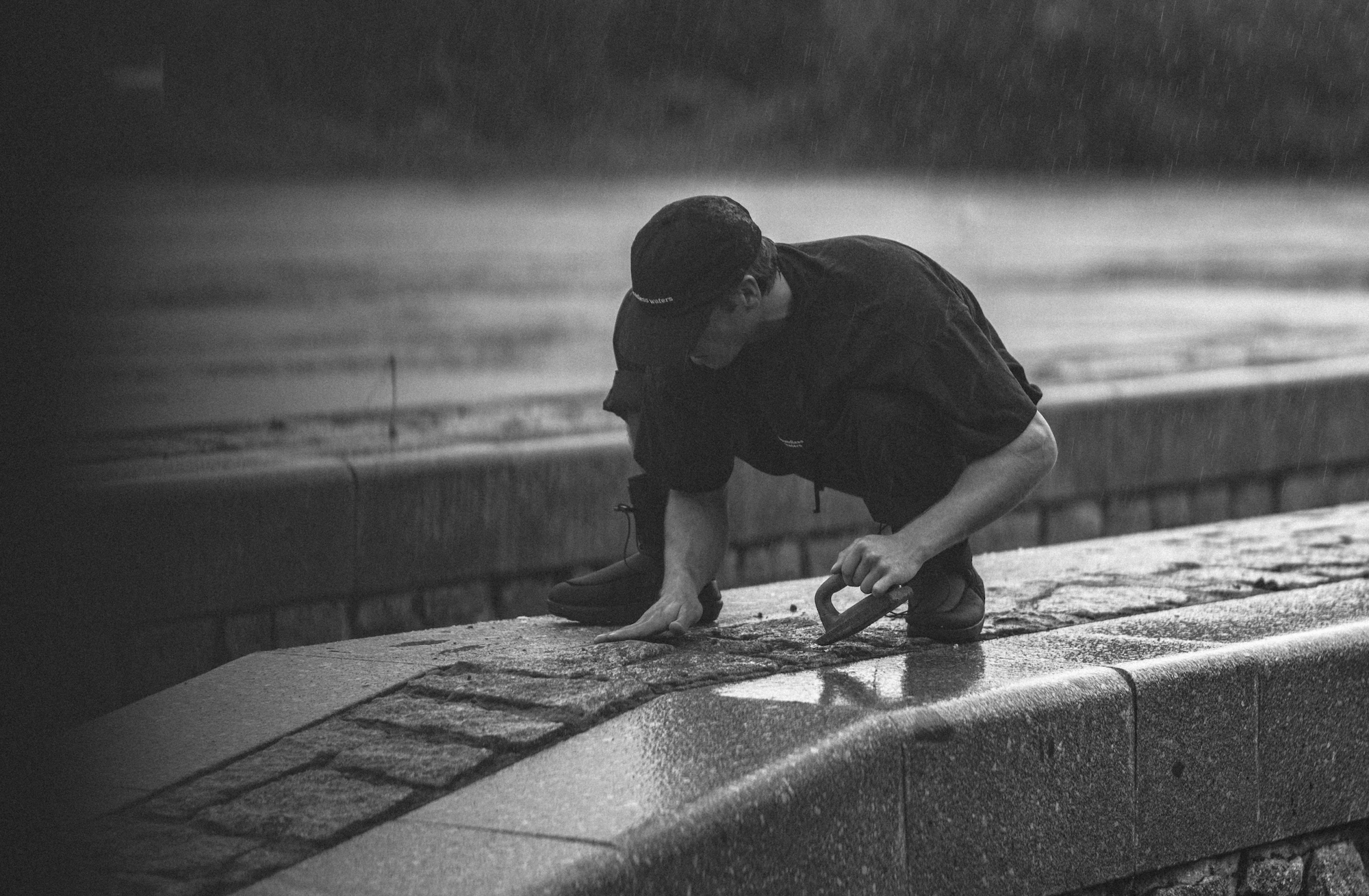 Crew working on set in the rain